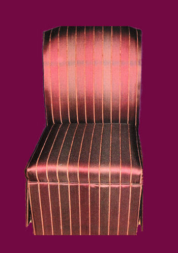 Armless chair upholstered in stripe fabric