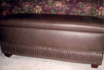 Padded brown naugahyde bench